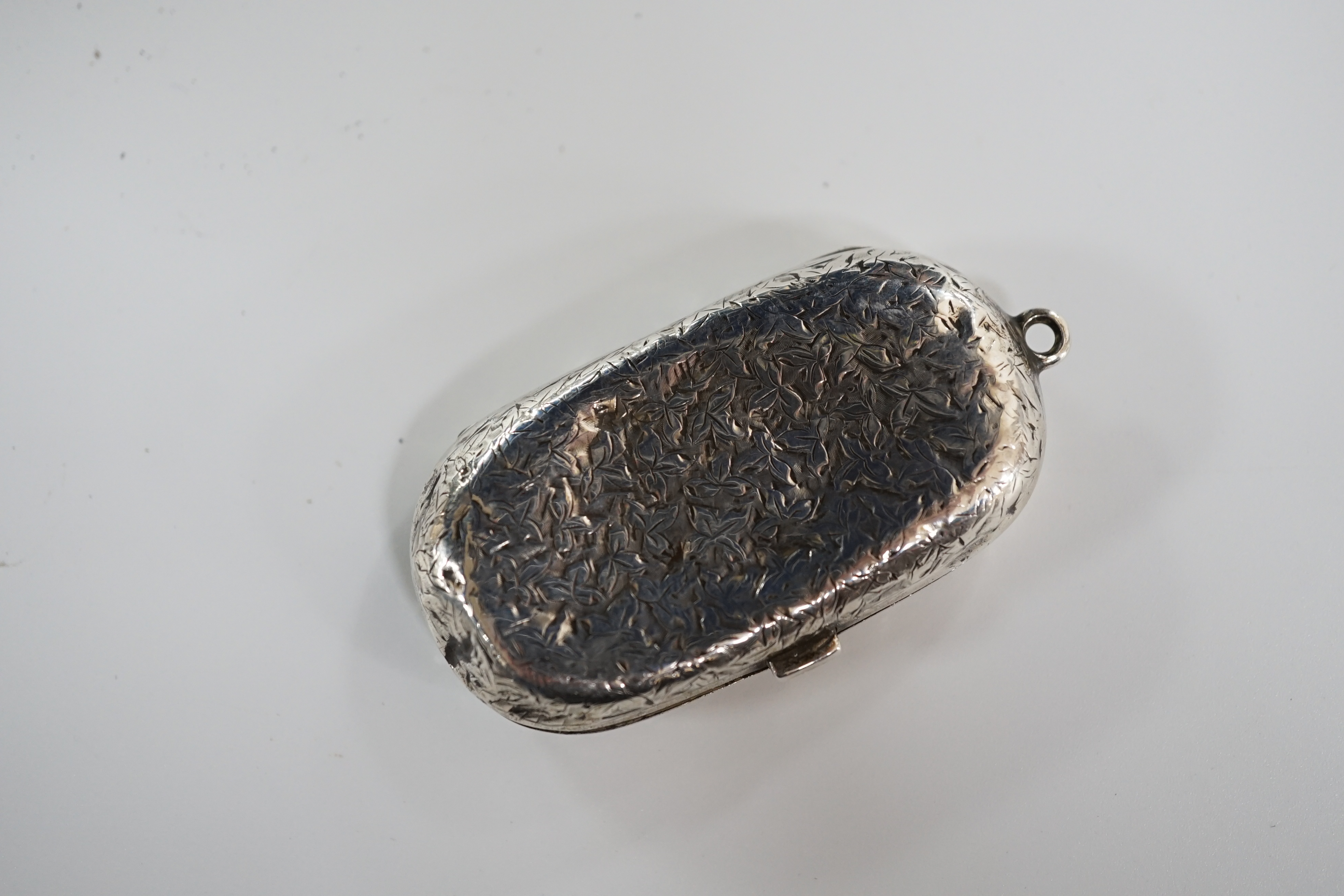 A late Victorian engraved silver sovereign/half sovereign case, William Hare Hassler? Birmingham, 1900, 57mm. Condition - poor